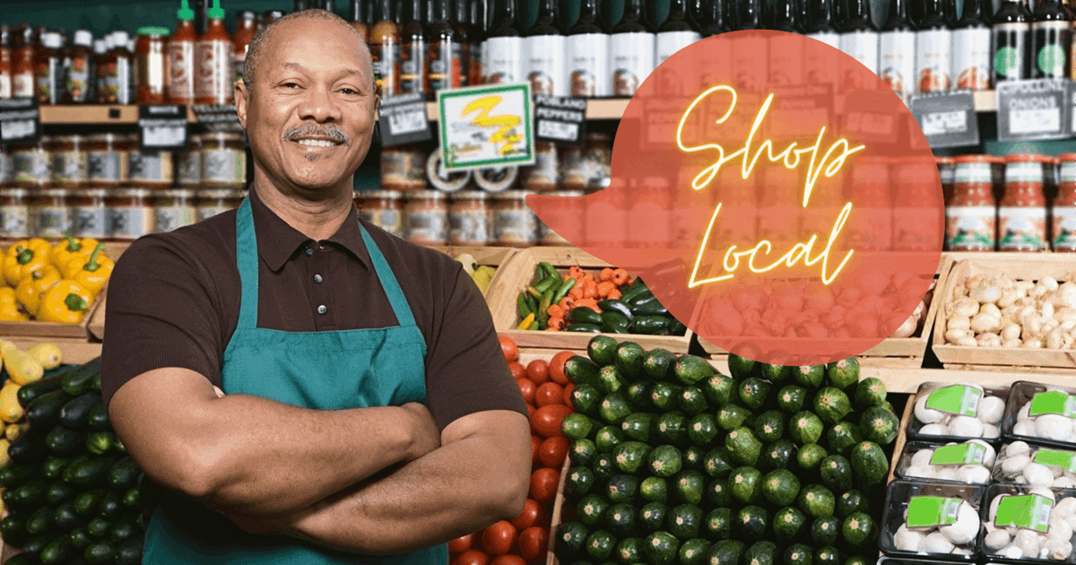 Self-employed Greengrocer promoting shop local